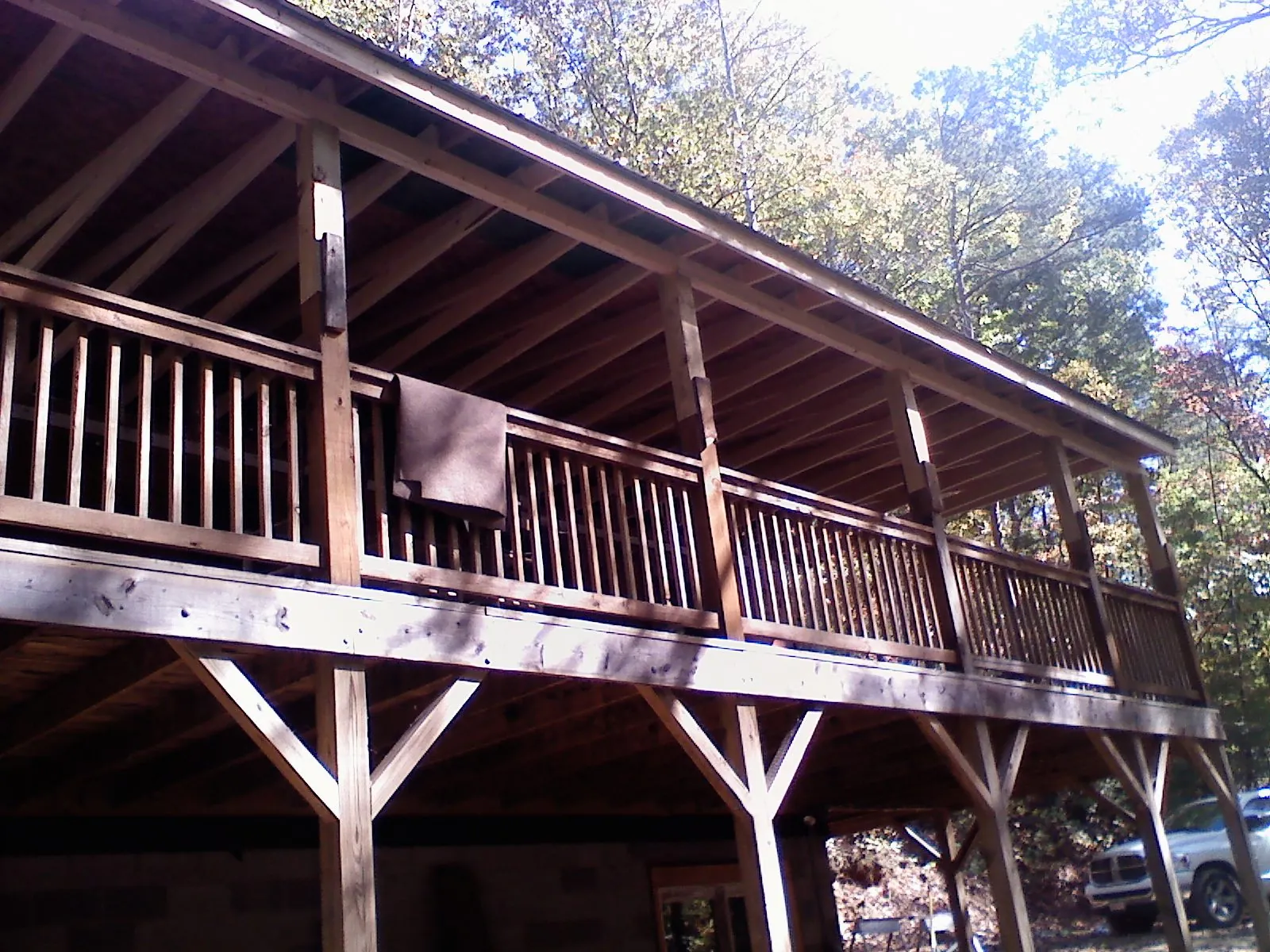 Timber framing under a new elevated porch and deck — Roof Leak Repair in Goodfield by Roofing Brothers